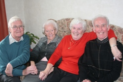 Celebrating Sally's 100th birthday are, from left: Lionel Savin, son-in-law; Sally; Ann, Sally's daughter and James, Sally's son.